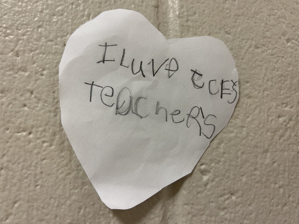 heart with writing that says "I love JCE's teachers"